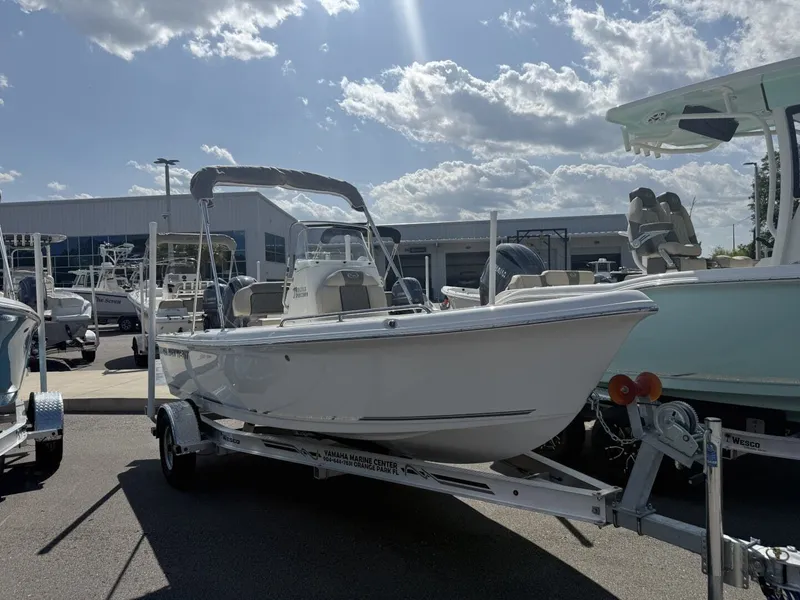 The Image of 2026 Key West 1720 Center Console boat on trailer outdoors. - 1