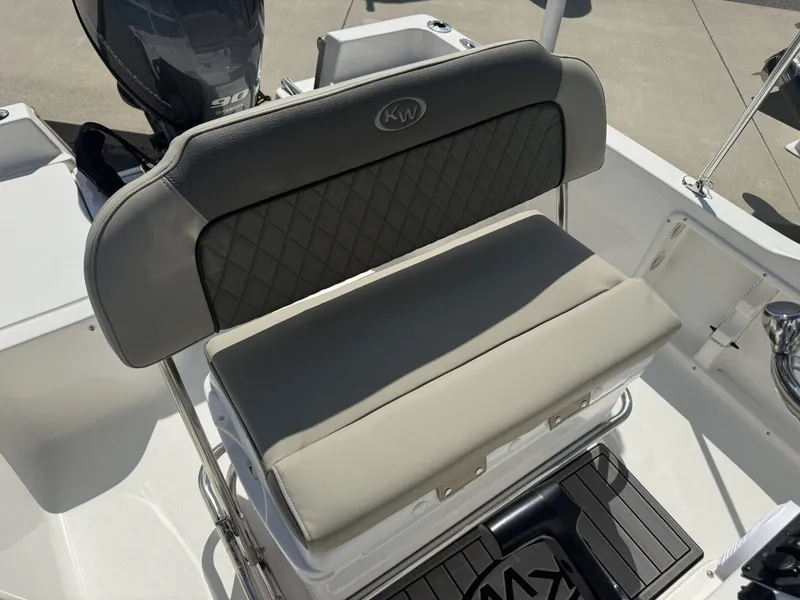 Slide: The Image of Key West 1720 Center Console 2026 seat and motor view. - 10
