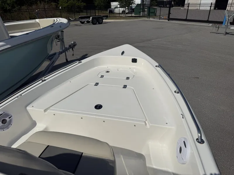 Slide: The Image of Key West 1720 Center Console boat, 2026 model, parked outdoors. - 11