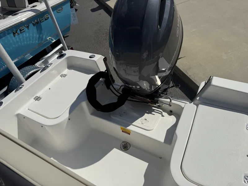 Slide: The Image of Key West 1720 Center Console boat with outboard motor, year 2026. - 7