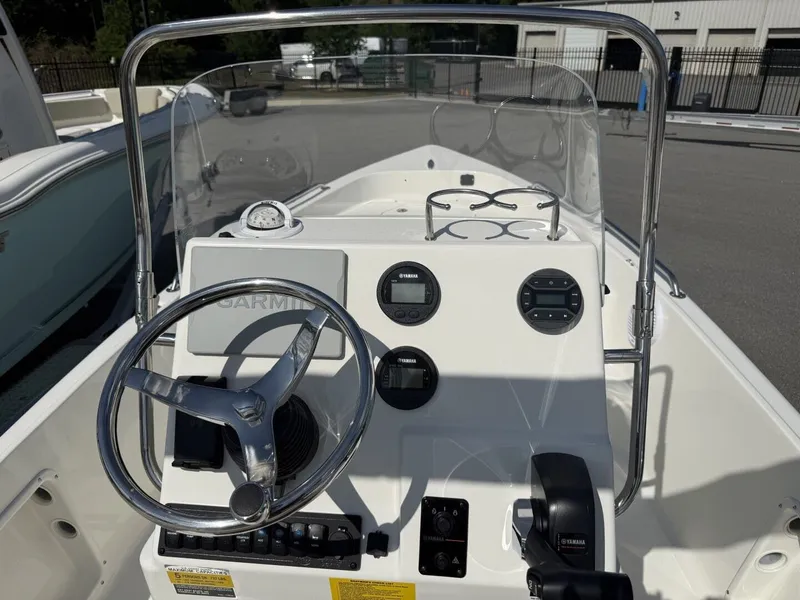 Slide: The Image of 2026 Key West 1720 Center Console boat dashboard with Garmin display. - 8