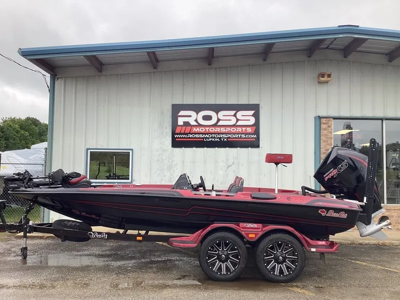 The Image of 2026 Bass Cat Eyra SP boat in front of Ross Motorsports building. - 1