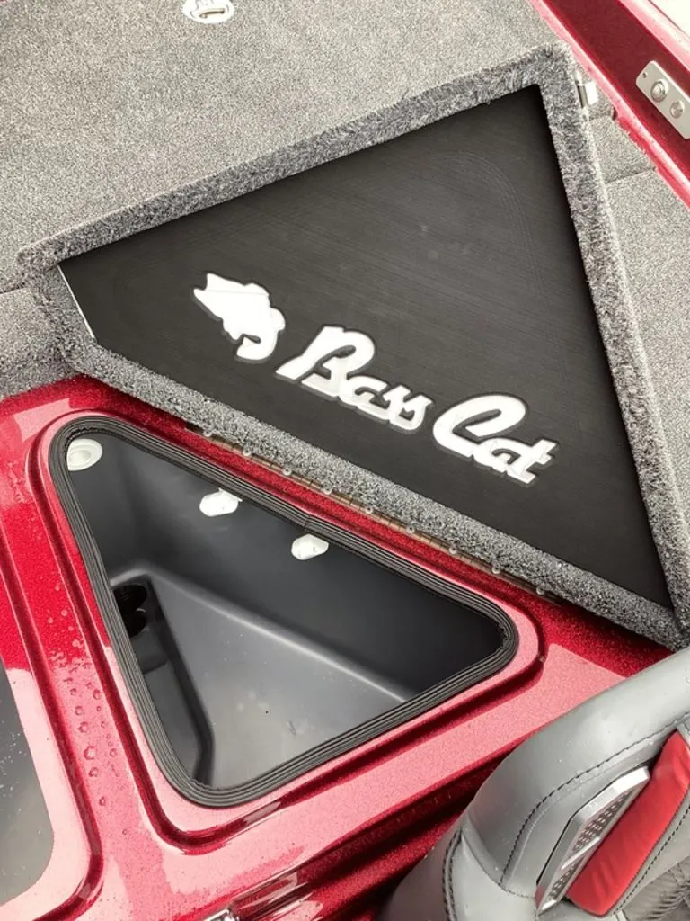 Slide: The Image of Bass Cat Eyra SP 2026, red storage compartment open. - 26