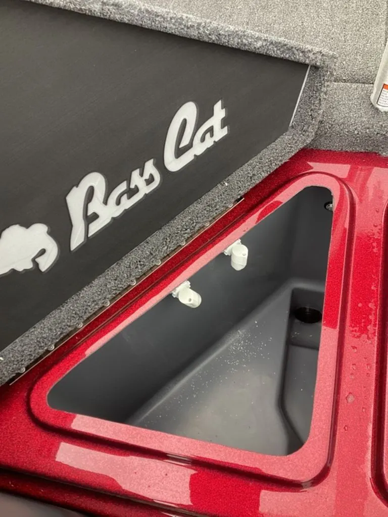Slide: The Image of Bass Cat Eyra SP 2026, red storage compartment open. - 28
