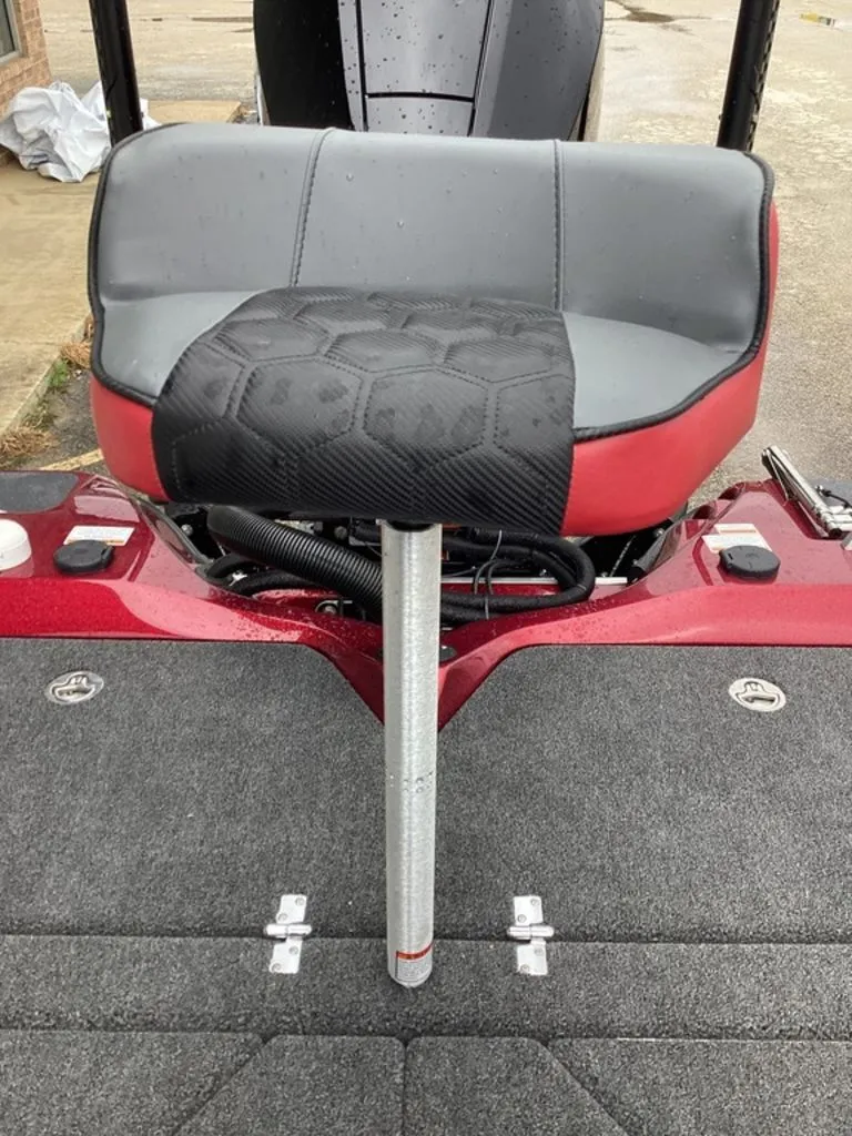 Slide: The Image of 2026 Bass Cat Eyra SP boat with gray and red seat. - 30