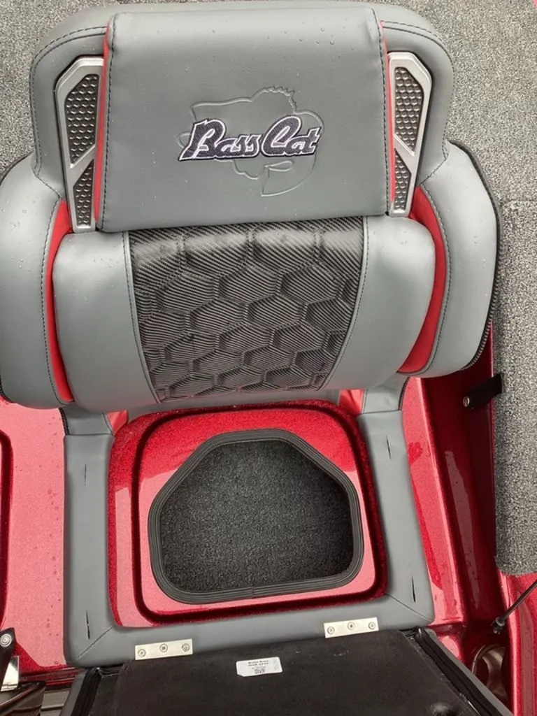 Slide: The Image of Bass Cat Eyra SP 2026 seat with red and gray design. - 33
