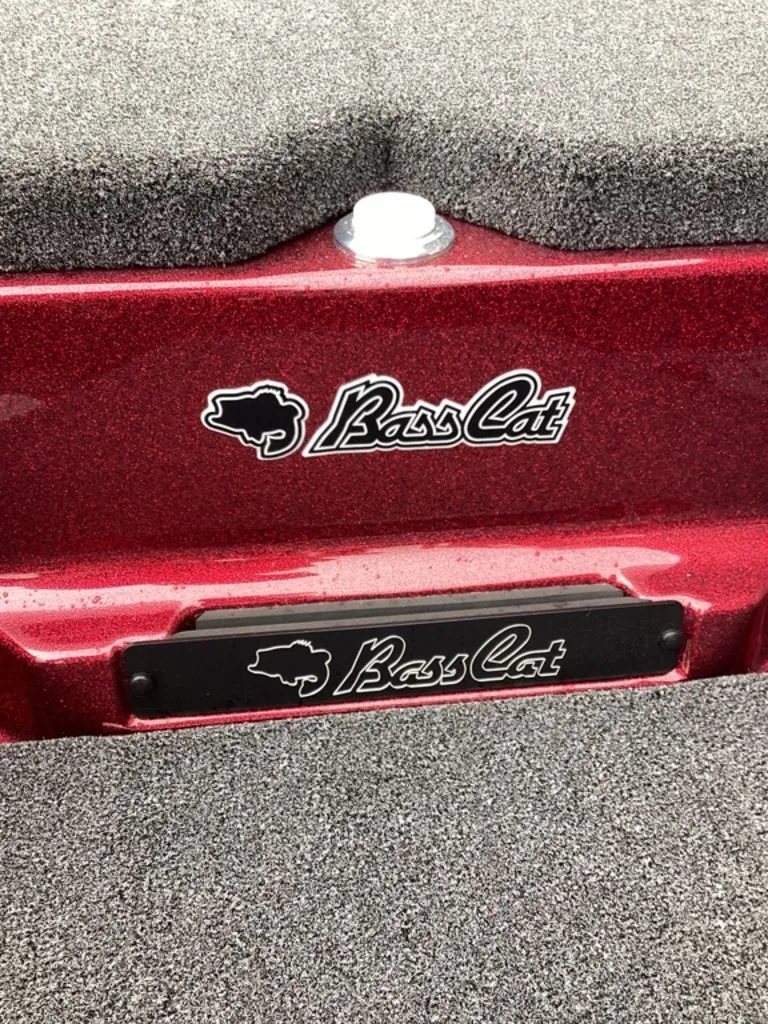 Slide: The Image of 2026 Bass Cat Eyra SP boat with red metallic finish. - 42