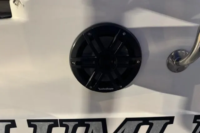 Slide: The Image of Speaker on 1995 Maxum 2700 SR boat, featuring a sleek black design. - 16