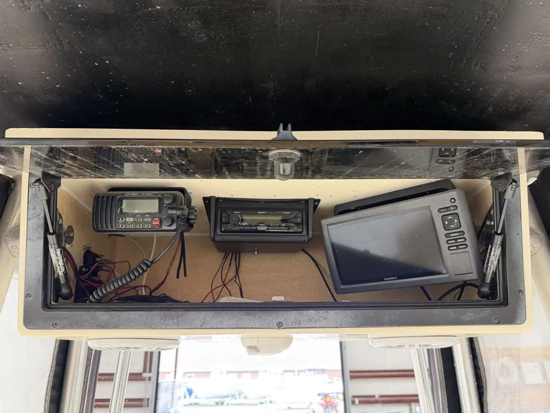 Slide: The Image of Electronics compartment of a 2005 Key West 225 boat. - 17
