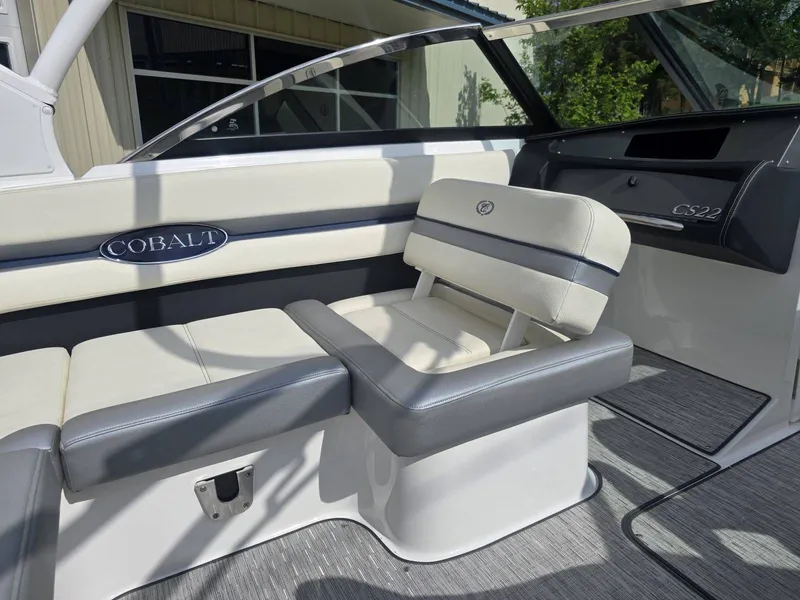 Slide: The Image of Interior of a 2021 Cobalt CS22 boat with comfortable seating. - 14