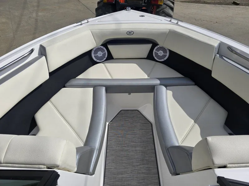 Slide: The Image of Interior of a 2021 Cobalt CS22 boat with white upholstery. - 17