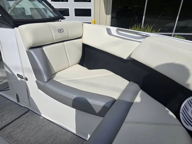 Slide: The Image of Interior of a 2021 Cobalt CS22 boat with beige seating. - 19