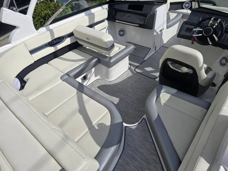 Slide: The Image of Interior of a 2021 Cobalt CS22 boat with luxurious seating. - 9