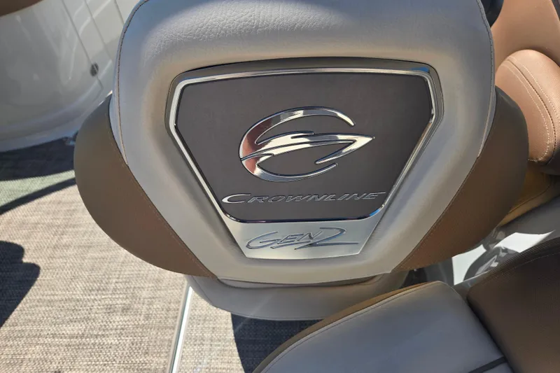 Slide: The Image of Crownline Eclipse E235 2021 boat seat with logo and Gen 2 emblem. - 21