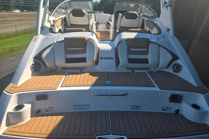 Slide: The Image of 2022 Yamaha Boats 212SD with spacious seating and sleek design. - 3