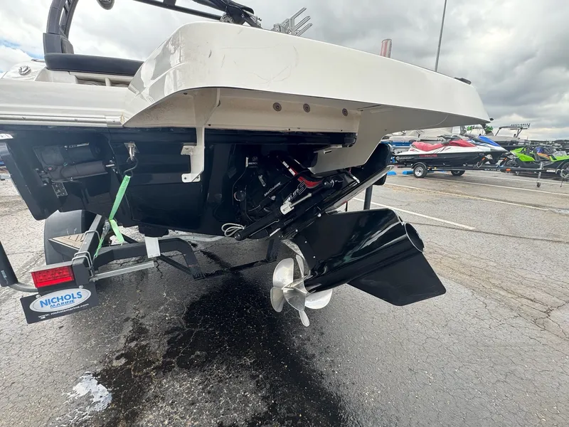 Slide: The Image of Rear view of a 2021 Chaparral Surf 21 boat on a trailer. - 8
