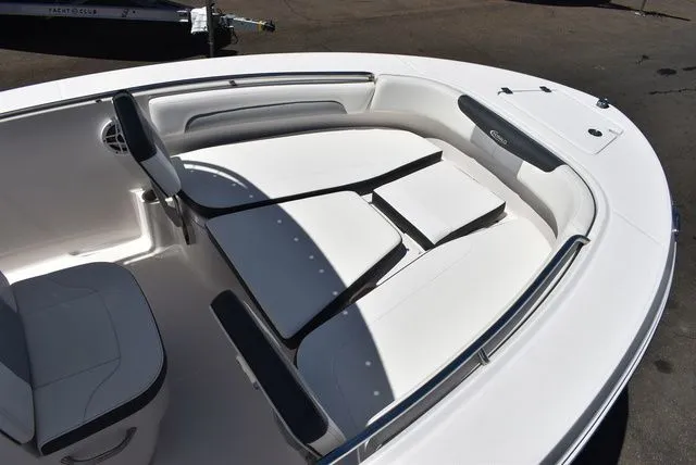 Slide: The Image of Interior view of 2023 Robalo R202 Explorer boat with seating area. - 16