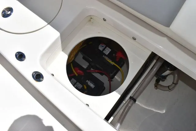 Slide: The Image of Battery compartment of 2023 Robalo R202 Explorer boat. - 26