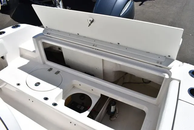 Slide: The Image of 2023 Robalo R202 Explorer boat storage and engine area - 27