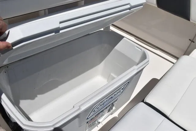 Slide: The Image of Open cooler on a 2023 Robalo R202 Explorer boat. - 29