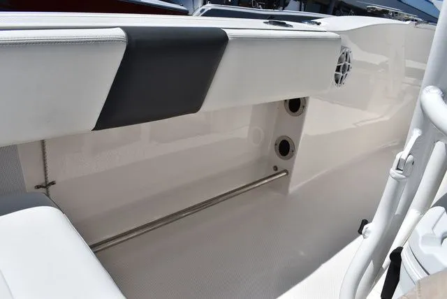 Slide: The Image of Interior of 2023 Robalo R202 Explorer with white upholstery. - 32
