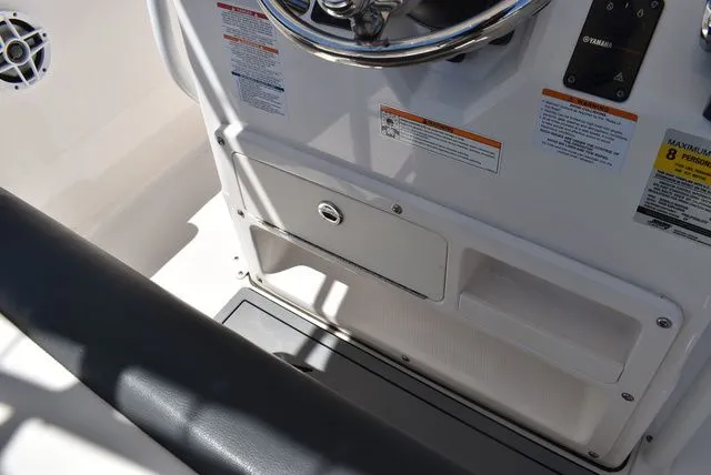 Slide: The Image of 2023 Robalo R202 Explorer helm console with seating. - 35