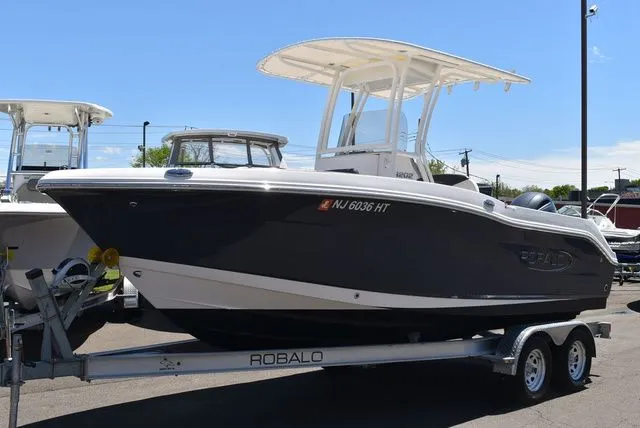 Slide: The Image of 2023 Robalo R202 Explorer boat on trailer, side view. - 4