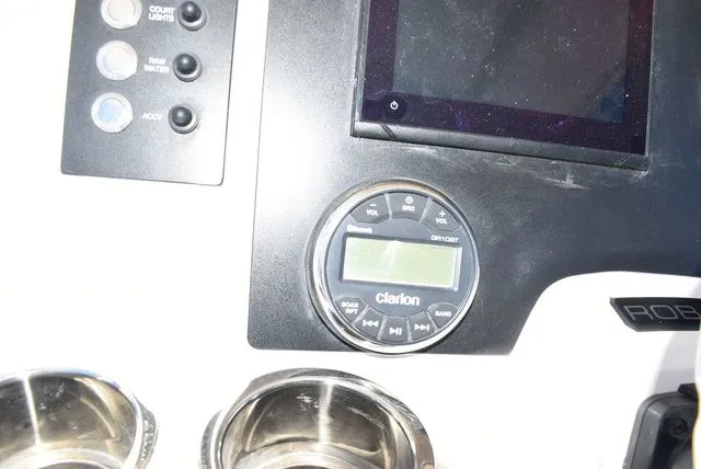 Slide: The Image of Dashboard of 2023 Robalo R202 Explorer with Clarion control. - 40