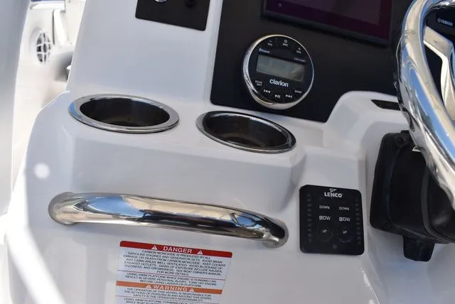 Slide: The Image of 2023 Robalo R202 Explorer helm with steering wheel and controls. - 42