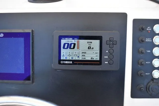 Slide: The Image of Yamaha control panel on 2023 Robalo R202 Explorer dashboard. - 44