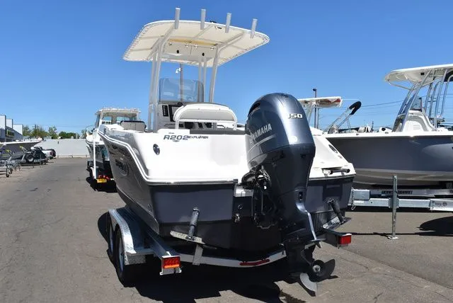 Slide: The Image of 2023 Robalo R202 Explorer boat with Yamaha engine on trailer. - 7