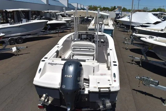 Slide: The Image of 2023 Robalo R202 Explorer boat in a parking lot. - 9