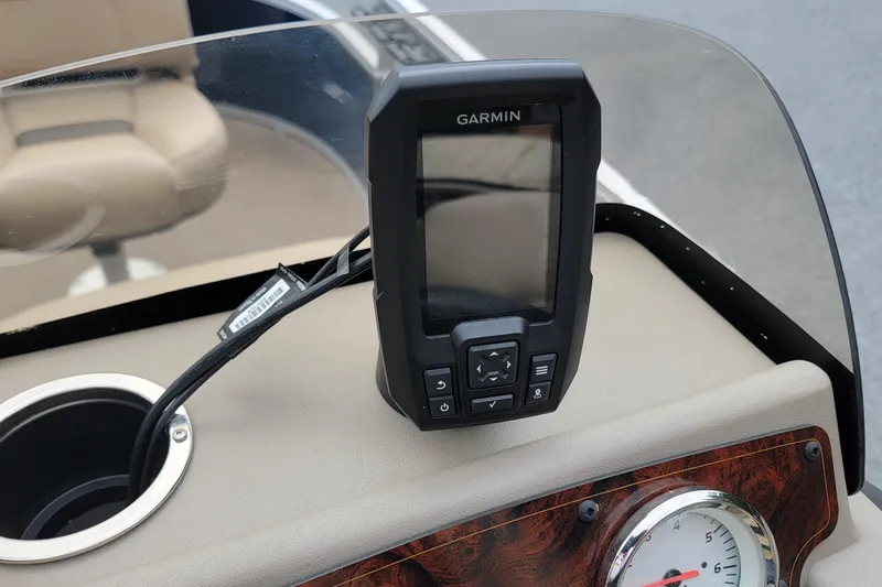 Slide: The Image of Garmin device on 2024 Sun Tracker Bass Buggy 16 XL Select dashboard. - 7