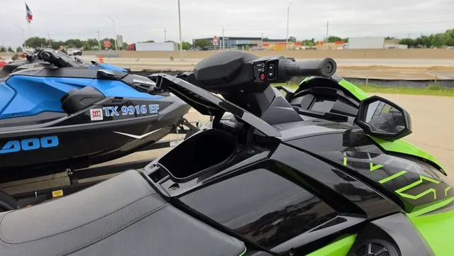 Slide: The Image of Yamaha WaveRunner VX1800B-WB 2021 in green and black on a parking lot. - 14