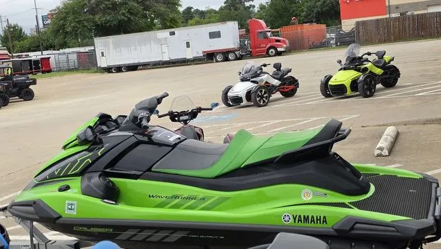Slide: The Image of Green 2021 Yamaha WaveRunner VX1800B-WB in a parking lot. - 6