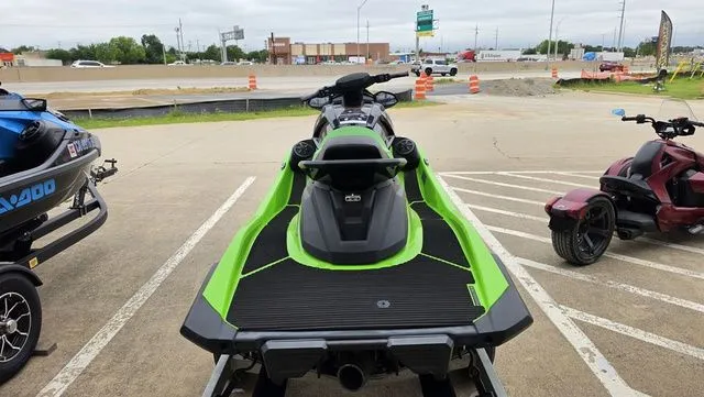 Slide: The Image of 2021 Yamaha WaveRunner VX1800B-WB in green on parking lot. - 7