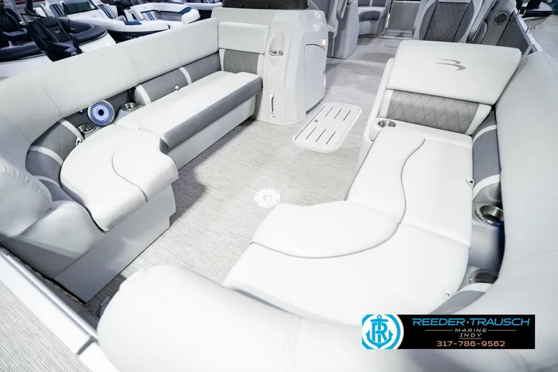 Slide: The Image of Interior of 2023 Bennington 23 LSR pontoon boat with luxurious seating and modern design. - 13
