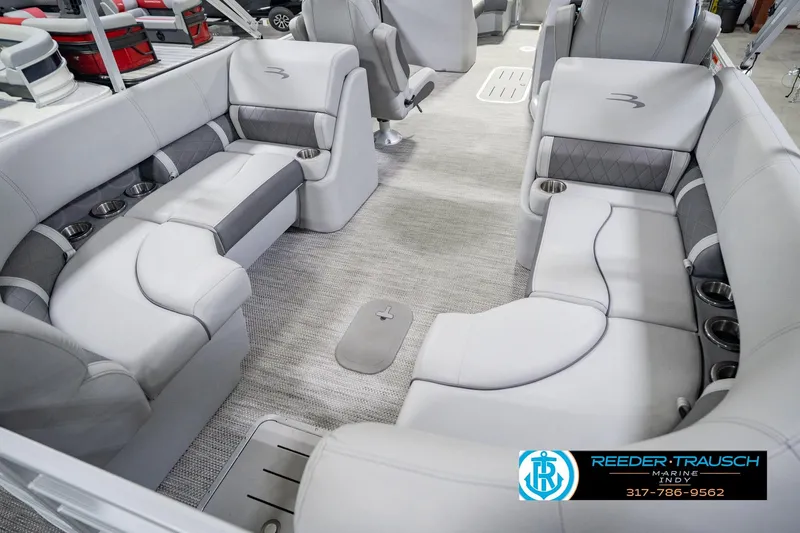Slide: The Image of 2023 Bennington 23 LSR boat interior with luxurious gray seating and cup holders. - 16