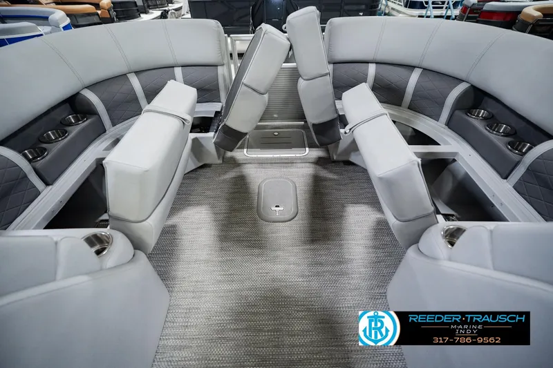 Slide: The Image of Interior of 2023 Bennington 23 LSR pontoon boat with gray seating and cup holders. - 35