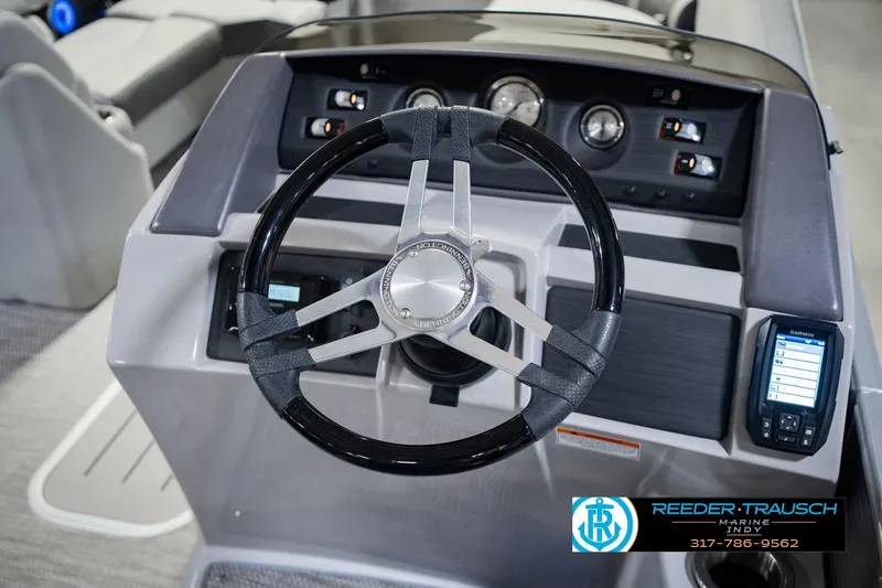 Slide: The Image of Steering console of 2023 Bennington 23 LSR boat with Garmin navigation system. - 36