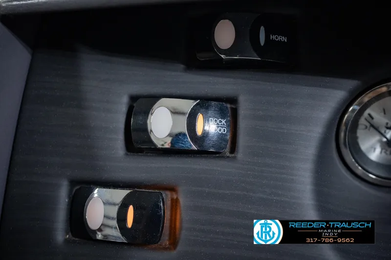 Slide: The Image of Control panel of 2023 Bennington 23 LSR boat with horn and dock mood switches. - 40