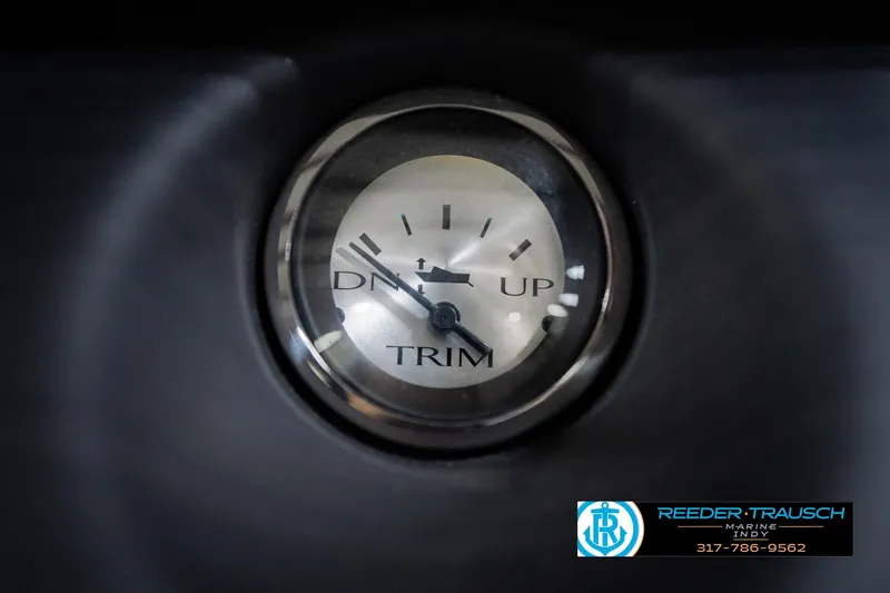 Slide: The Image of Trim gauge on 2023 Bennington 23 LSR boat dashboard, indicating trim position. - 41
