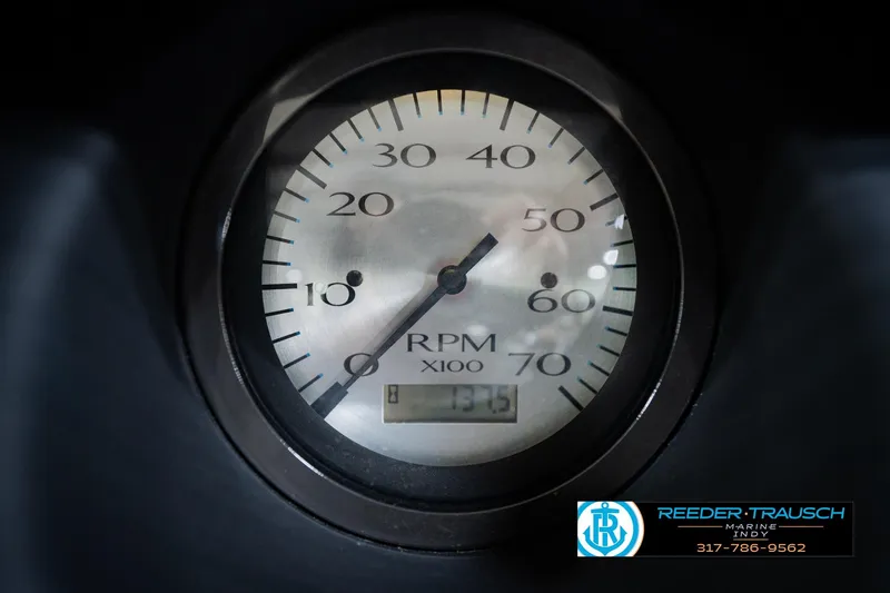Slide: The Image of Close-up of a 2023 Bennington 23 LSR RPM gauge, displaying 137.5 hours. - 42