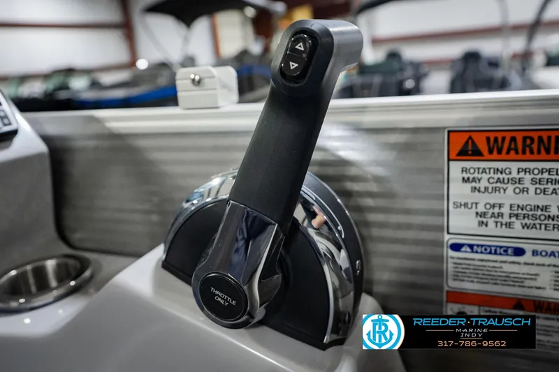 Slide: The Image of Throttle control of 2023 Bennington 23 LSR boat with warning label and logo. - 46