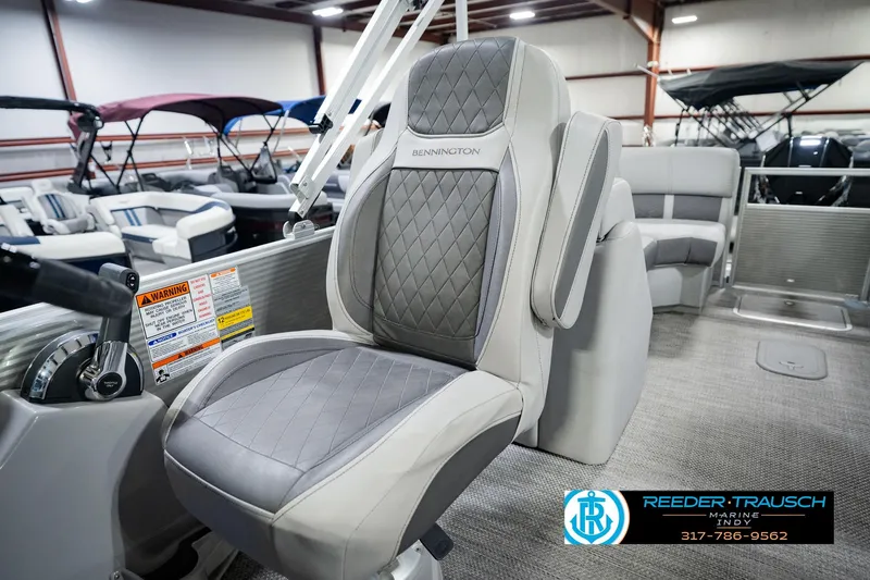 Slide: The Image of 2023 Bennington 23 LSR boat seat with quilted design in showroom. - 47