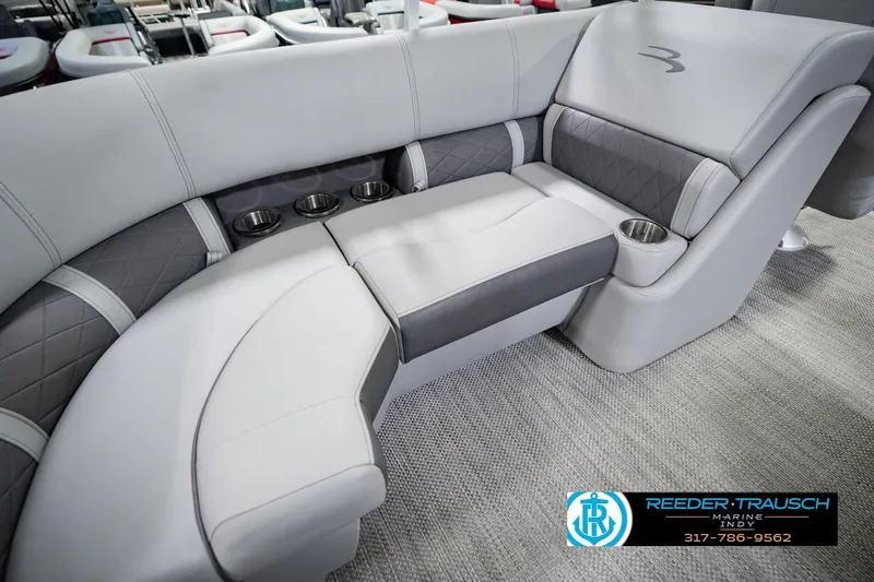 Slide: The Image of Luxurious seating in the 2023 Bennington 23 LSR pontoon boat with cup holders. - 51