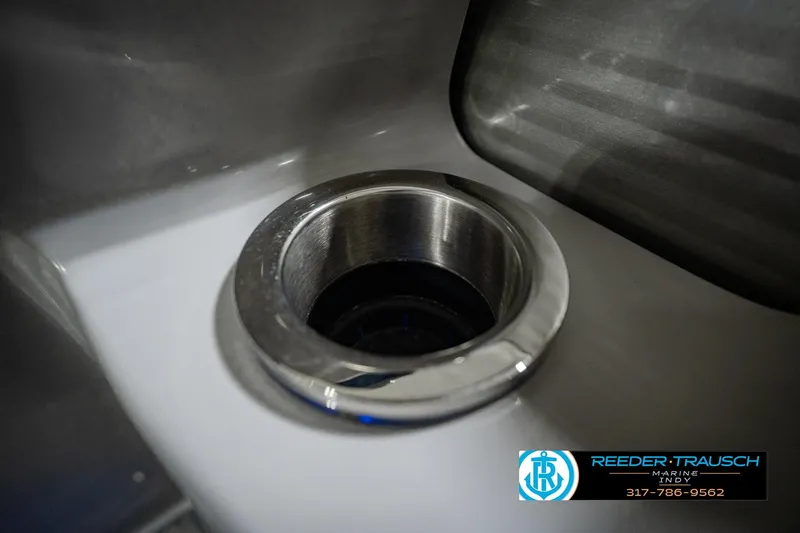 Slide: The Image of Close-up of a stainless steel sink on a 2023 Bennington 23 LSR boat. - 54