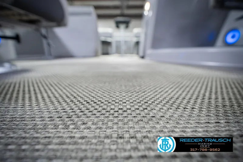 Slide: The Image of Close-up of 2023 Bennington 23 LSR boat flooring, showcasing textured design. - 55