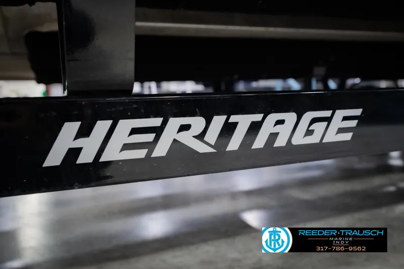 Slide: The Image of Close-up of 'Heritage' logo on Bennington 23 LSR 2023 boat trailer. - 63