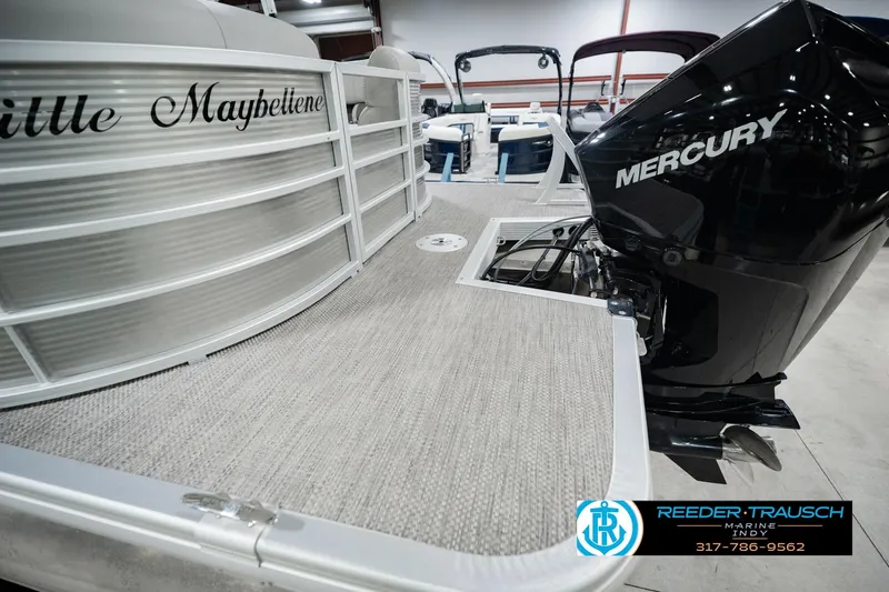 Slide: The Image of 2023 Bennington 23 LSR pontoon boat with Mercury engine in showroom. - 65